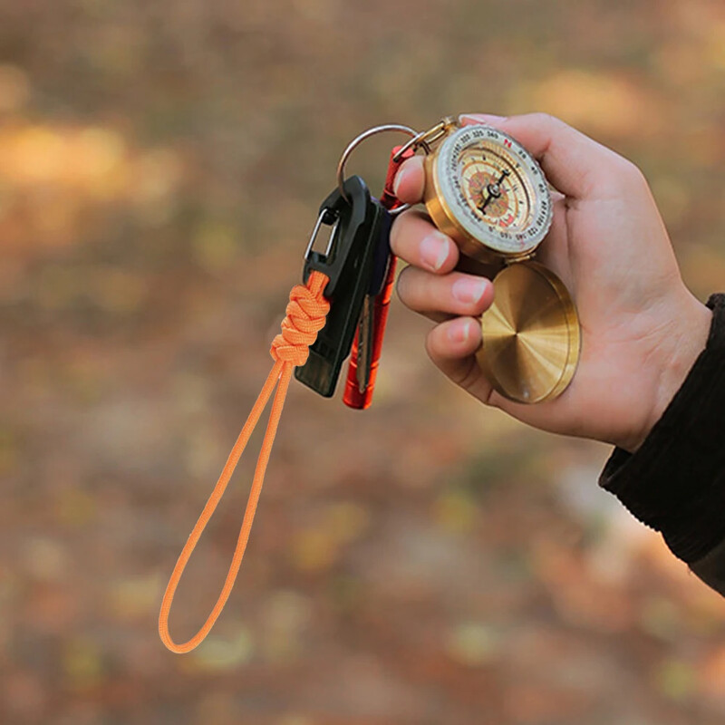 Paracord atslēgu piekariņa aukla Augstas izturības izpletņa aukla izdzīvošanas mugursoma atslēgu piekariņš zibspuldzes kamera pret pazaudēšanu pakarināmā virve