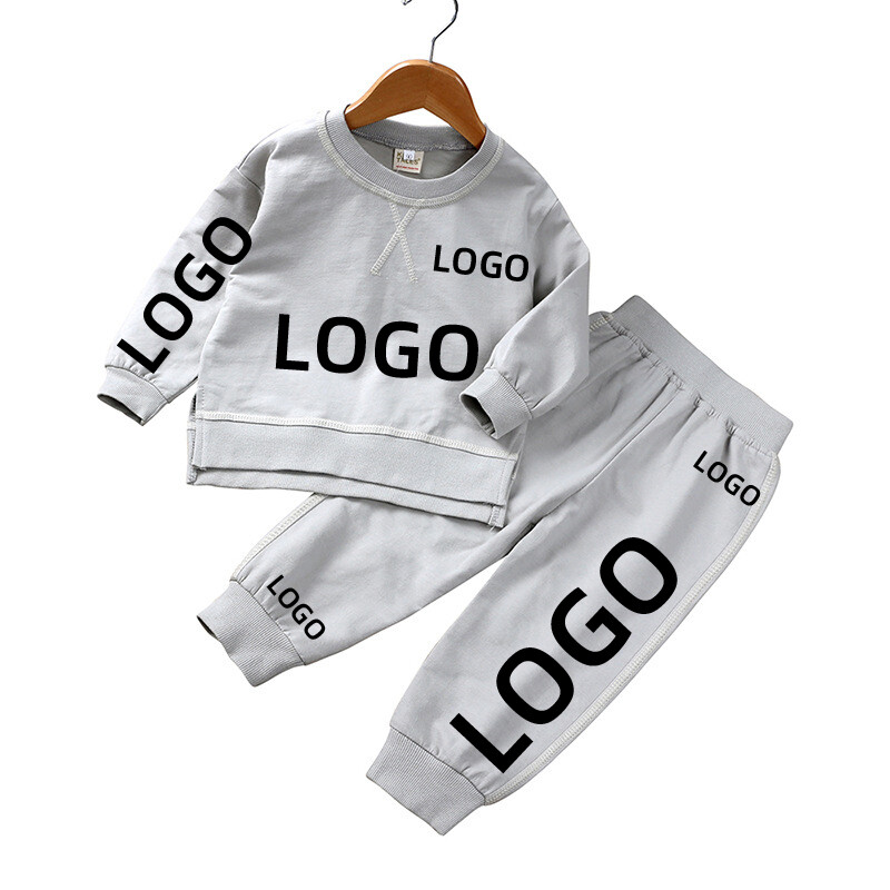 Jesenska korejska dječja odjeća za dječake i djevojčice Dodajte svoj logotip Široka trenirka Prilagođeni puloveri Top+hlače Kompleti od 2 kom. Kompleti odjeće za bebe
