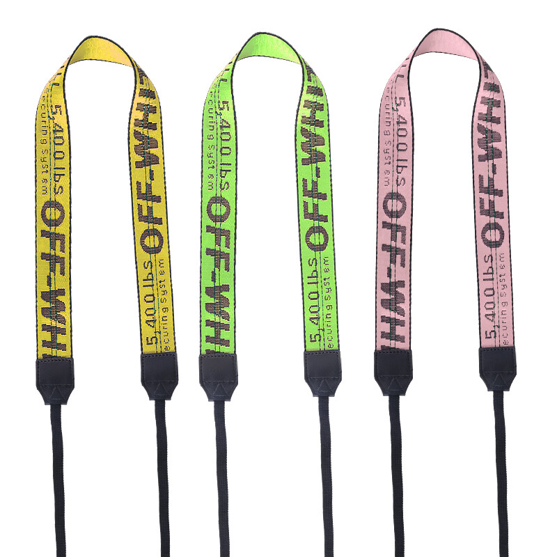 "Moderan remen u boji - više opcija boja, pogodan za sve stilove fotoaparata."