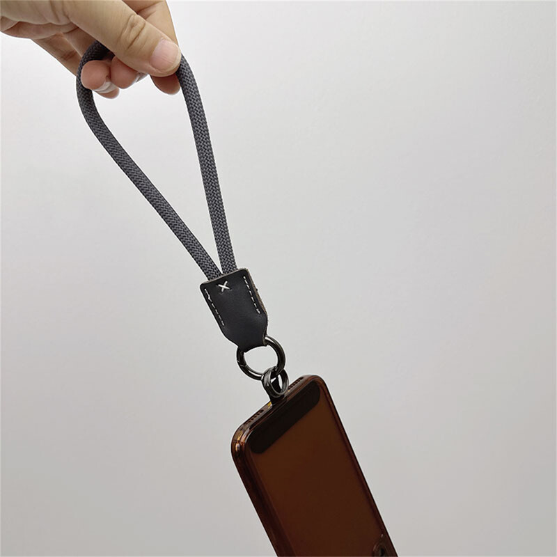 Nova najlonska vrpca za mobilni telefon na zglobu Pu kožna glava Upletena kratka kopča za uže za mobilni telefon protiv pada Uže za školjku mobilnog telefona