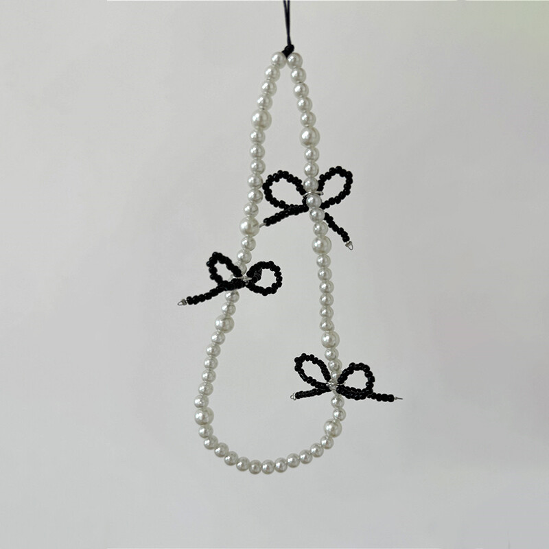 Korejski slatki 3D crni ružičasti telefonski lanac s perlama i mašnama za iPhone Kamera Viseći konopac Privjesak Anti-Lost Lanyard Viseći nakit