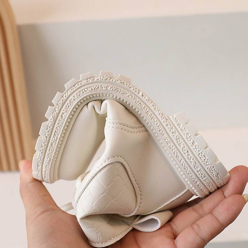 2023. gada rudens jauni bērnu ādas zābaki zēniem un meitenēm ikdienas britu stila Mārtiņa zābaki vidēji un lieli bērnu īsi zābaki ar mīkstu zoli