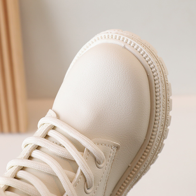 2023. gada rudens jauni bērnu ādas zābaki zēniem un meitenēm ikdienas britu stila Mārtiņa zābaki vidēji un lieli bērnu īsi zābaki ar mīkstu zoli