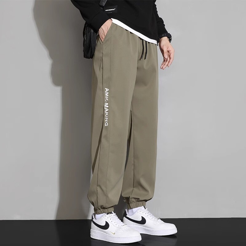 NASA vīriešu kaklasaites bikses 2024. gada pavasara jauna moderna zīmola ikdienas bikses, brīvas un daudzpusīgas deviņu punktu sporta bikses