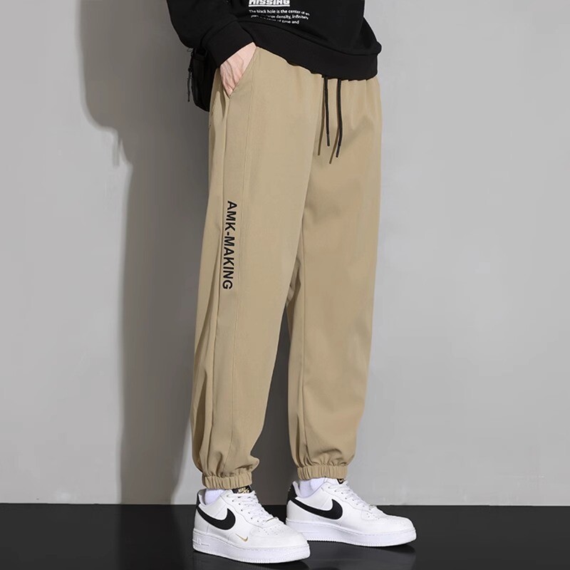 NASA vīriešu kaklasaites bikses 2024. gada pavasara jauna moderna zīmola ikdienas bikses, brīvas un daudzpusīgas deviņu punktu sporta bikses