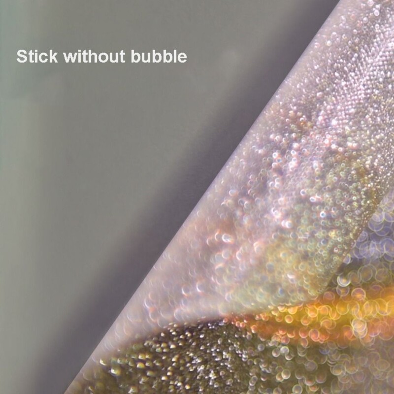 16-tollised sülearvuti kleebised katavad säravaid nahka