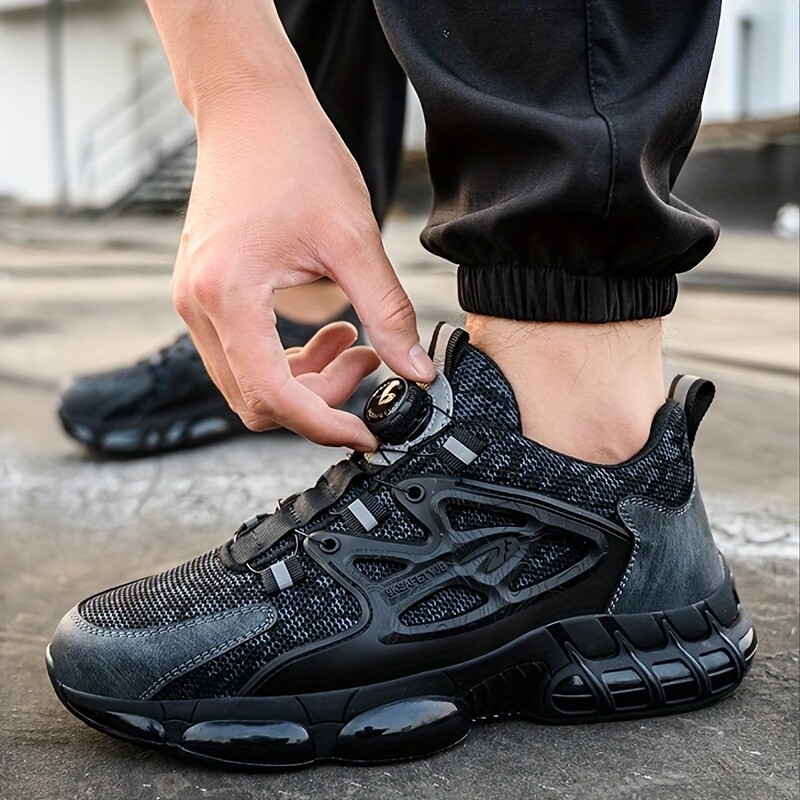 Pöörleva nupuga turvajalatsid Meeste terasest varbaga tossud õhkpadjaga tööjalatsid Meeste torkekindlad töökaitsesaapad kaitsekingad