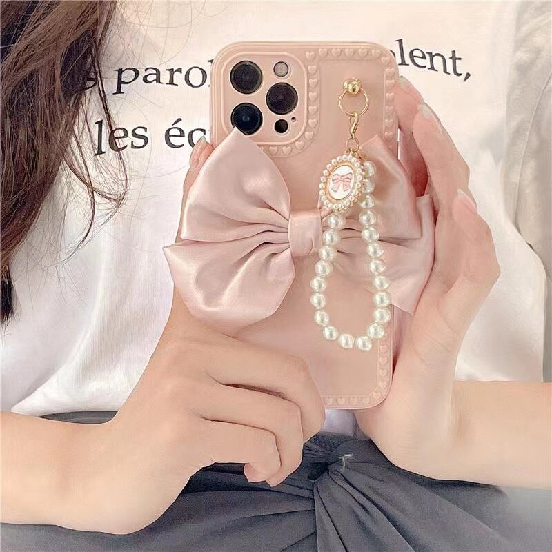 Сладък луксозен моден 3d Bow Pearl Bracelet Girl Мек калъф за Iphone 15 14 11 12 13 Pro MaxXr X Xs 7 8 Se Anti-drop Cover Fundas