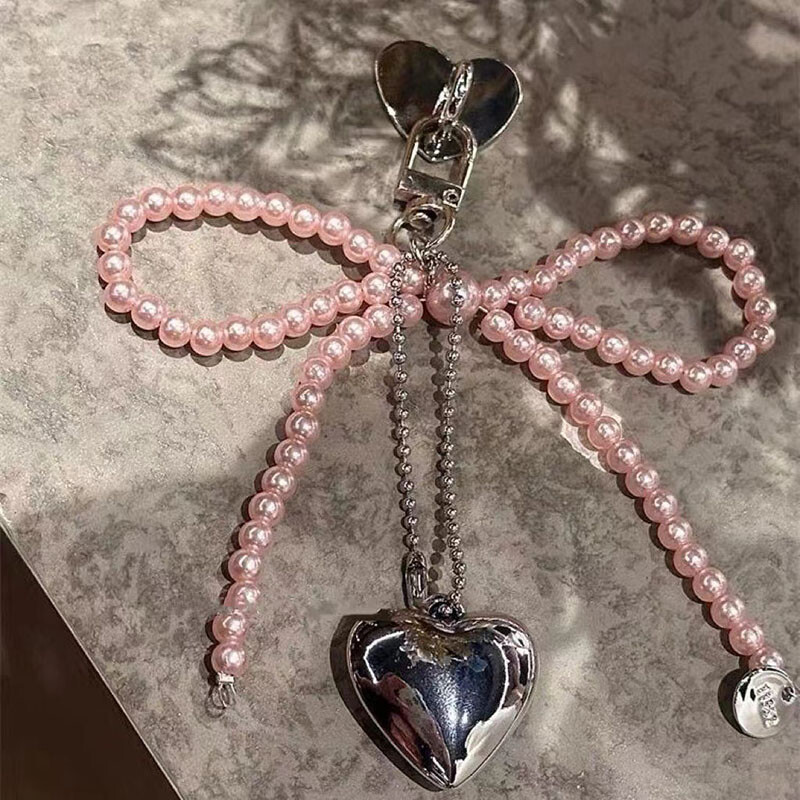 Модерен калъф с лък с любовно сърце за iPhone 15 13 16 Pro 12 14 11 Pro Max 8 7 Plus SE 2020 XS Max XS X висулка Капак за телефон с перлени мъниста