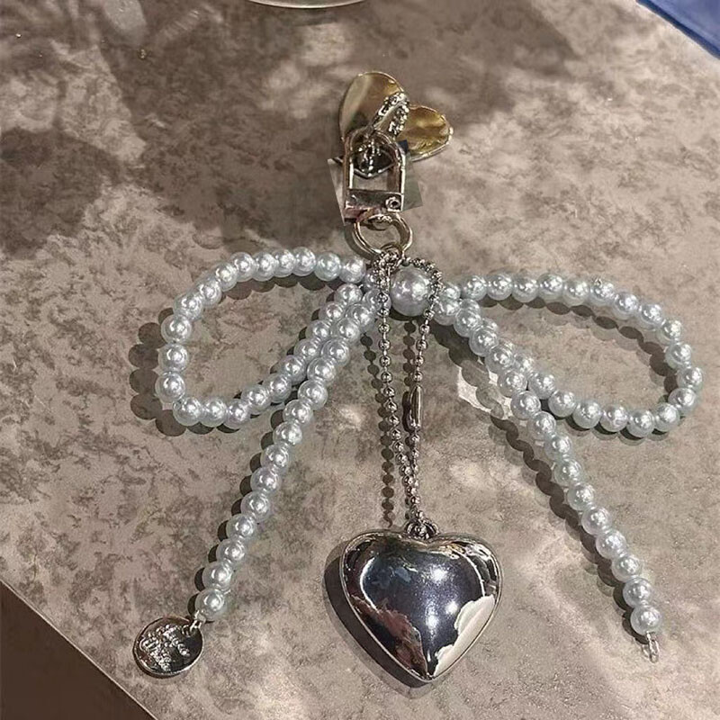 Модерен калъф с лък с любовно сърце за iPhone 15 13 16 Pro 12 14 11 Pro Max 8 7 Plus SE 2020 XS Max XS X висулка Капак за телефон с перлени мъниста