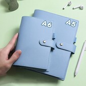 PU ādas A5/A6 iesiešanas piezīmjdatora vāciņš, atkārtoti uzpildāms 6 gredzenu stiprinājuma žurnāla dienas kārtības plānotāja vāks ar pildspalvas cilpu makarona krāsā