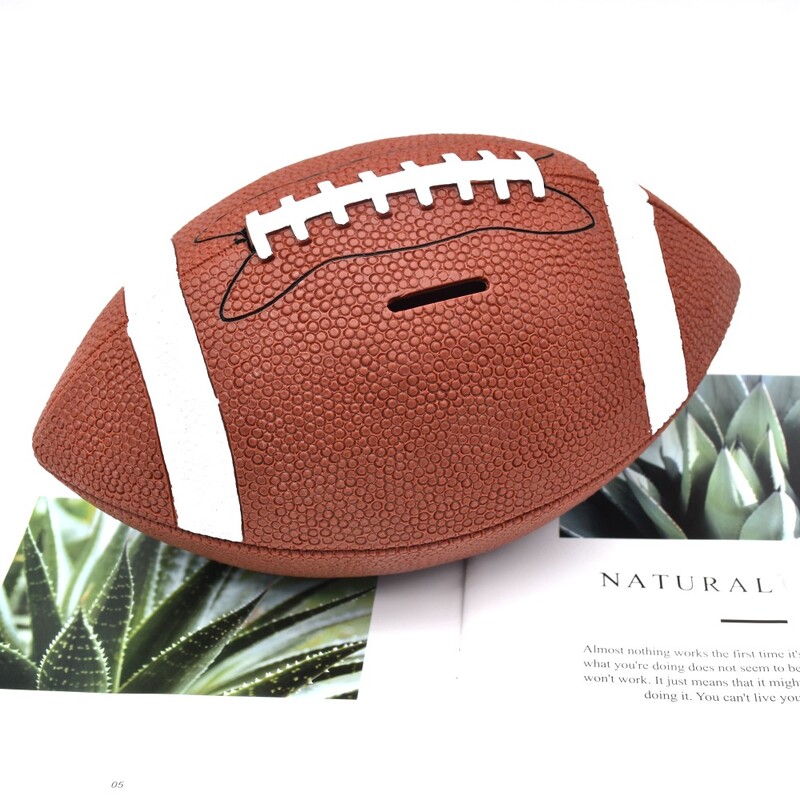 Ragbi kasica prasica. Može se pohraniti i dohvatiti. Presvučen vinilom. Otporan na padove. Simulacija. Desktop Ornament. Banka novac banka