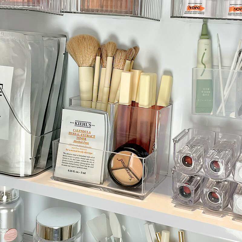 Läbipaistev akrüülist 3-5 ruudustikuga meigikarp, meigipintsli ämber, meigikorraldaja, õpilase laua pliiatsihoidja ehete hoiukarp