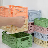 Organiziranje košara za pohranu u 4 boje. Kutija Sklopiva studentska stolna košara Samoljepljiva traka. Plastični sklopivi spremnik. Kutija za pohranu.