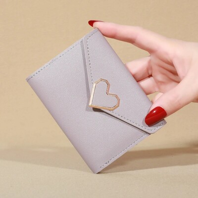 2023 Novi mali novčanik Ženski metalni kratki presavijeni personalizirani studentski slatki mini modni novčanik Zero Wallet