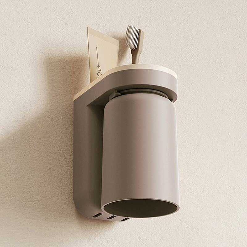 Daudzfunkcionāls zobu birstes statīvs Bez štancēšanas pie sienas stiprināms mutes skalošanas trauks Zobu birstes krūze Vannas istabas uzglabāšanas plaukta turētāja piederumi