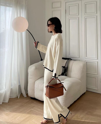 Moodsad värvitoonid kootud pükste komplektid naiste lahtised pikkade varrukatega kudumine kampsun lõhikuga laia säärega püksid kaheosaline komplekt naistele