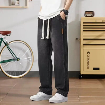 Vīriešu džinsi 2023. gads. Moderni, brīvi pieguļoši amerikāņu stila bikses, ikdienišķas, platas garas bikses vasaras vieglām džinsa biksēm