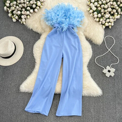 Sieviešu kombinezoni ar spalvām savienoti ar jostu, vienkrāsaini ar augstu vidukli. Bikses ar taisnām kājām Šiki, šauri sieviešu bodi