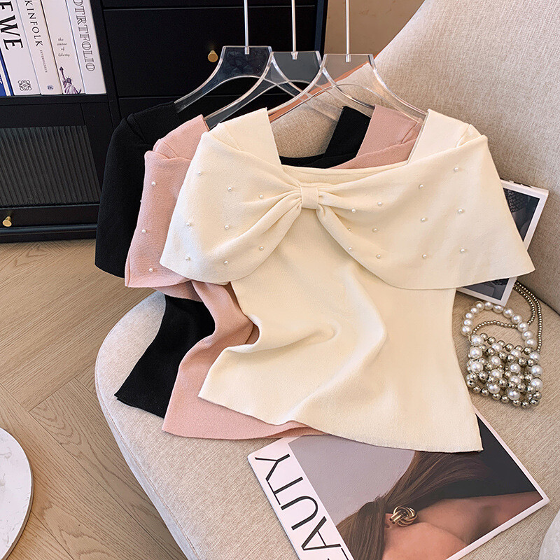 Sieviešu 2024. gada vasaras populārākie jauni franču maigi plecu modes Joker bantiņi ar īsām piedurknēm džemperis sieviešu t krekls