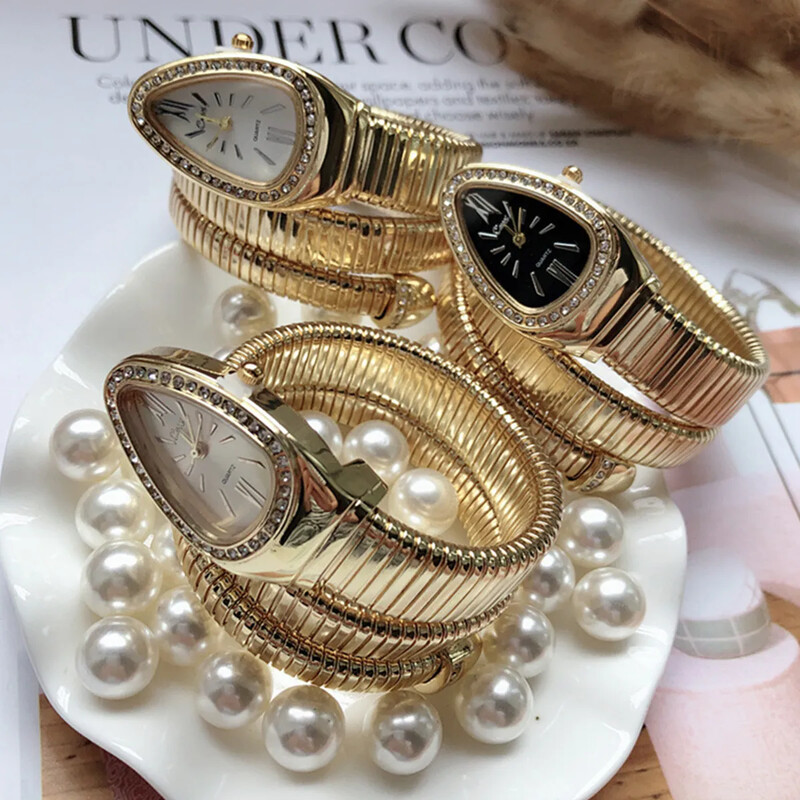 Sieviešu kvarca pulksteņu rokassprādze Nerūsējošā tērauda modes zelta sieviešu pulksteņi Pulkstenis Augstas kvalitātes luksusa sieviešu rokas pulkstenis (tikai pulkstenis)