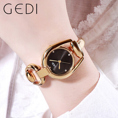 Gedi Brand Luksuzni zlatni čelični lanac Ženska kvarcna narukvica Mali brojčanik Dijamantni minimalistički vodootporni ženski ručni satovi