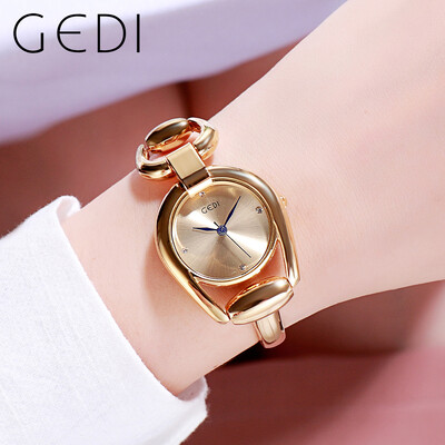 Gedi Brand Luksuzni zlatni čelični lanac Ženska kvarcna narukvica Mali brojčanik Dijamantni minimalistički vodootporni ženski ručni satovi