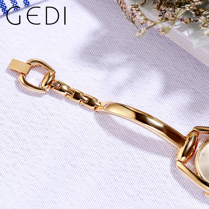 Gedi Brand Luksuzni zlatni čelični lanac Ženska kvarcna narukvica Mali brojčanik Dijamantni minimalistički vodootporni ženski ručni satovi
