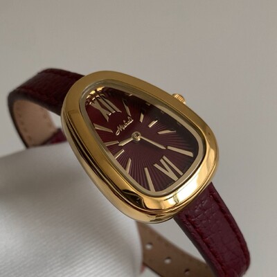 2025. gada jauns čūskas formas sieviešu pulkstenis ar īstas ādas siksniņu, vintage pulkstenis ar romiešu cipariem viegla greznība