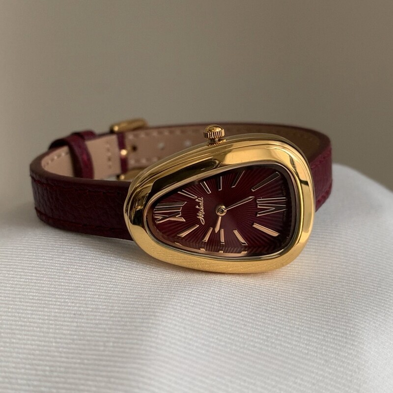 2025. gada jauns čūskas formas sieviešu pulkstenis ar īstas ādas siksniņu, vintage pulkstenis ar romiešu cipariem viegla greznība