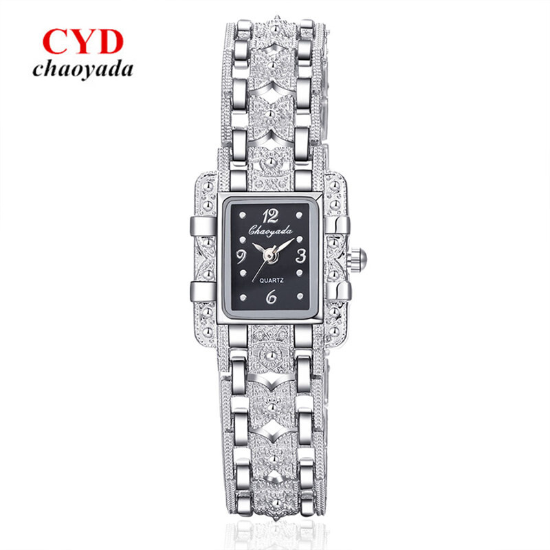 Sieviešu pulkstenis Taisnstūra ciparnīca Sudraba nerūsējošā tērauda kristāla pulksteņi Modes kvarcs sievietēm Sieviešu lielās relojes Karstā izpārdošana Relojes