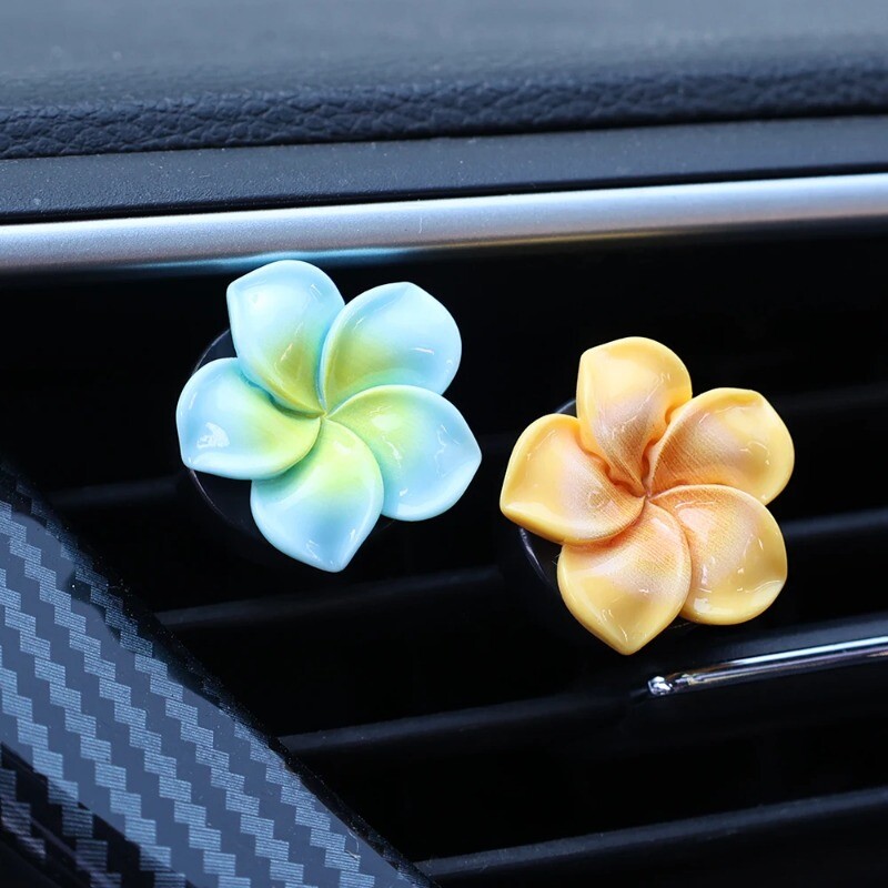 1/5 gab. Jaunu automašīnu gaisa ventilācijas atveru smaržu klipsis Olu zieda forma Auto gaisa atsvaidzinātājs Smaržas Aromterapijas difuzors Automašīnu interjera dekori