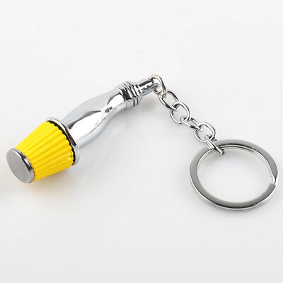 Auto modeļa atslēgu piekariņš, ķivere ar turbopūti, amortizators, bremžu disks, mugursoma, kulons, auto apdare