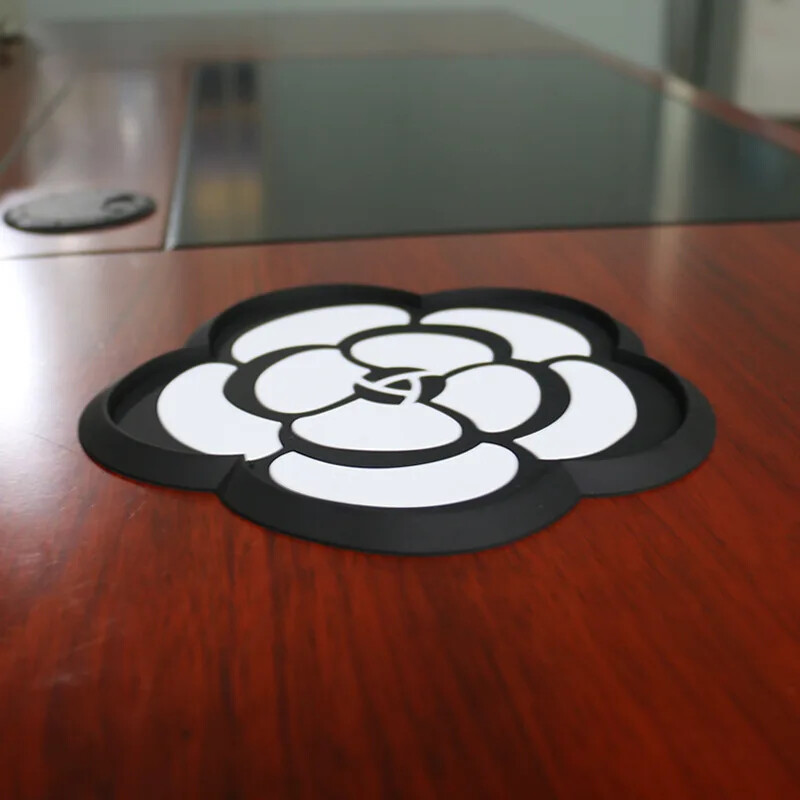 Automašīnas pretslīdēšanas paklājs, smaržas, rotājumi, briljanta uzlīmējamie sauļošanās līdzekļi, augstas temperatūras izturīgi kamēlijas dekoratīvie materiāli