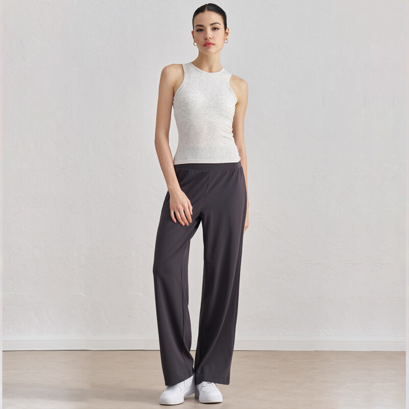 Ērta, rievota, bezpiedurkņu, sviesta, mīksta sieviešu virspuse ar augstu kakla izgriezumu, slaida, ikdienas vidukļa garuma joga skriešanas veste četros virzienos.