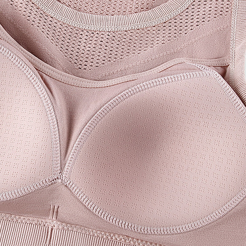 Jaunajai sieviešu sporta vestei ir integrēts krūšu polsteris, fiksēts triecienizturīgs sporta krūšturis, muguras izgriezums, fitnesa skriešanas jogas veste