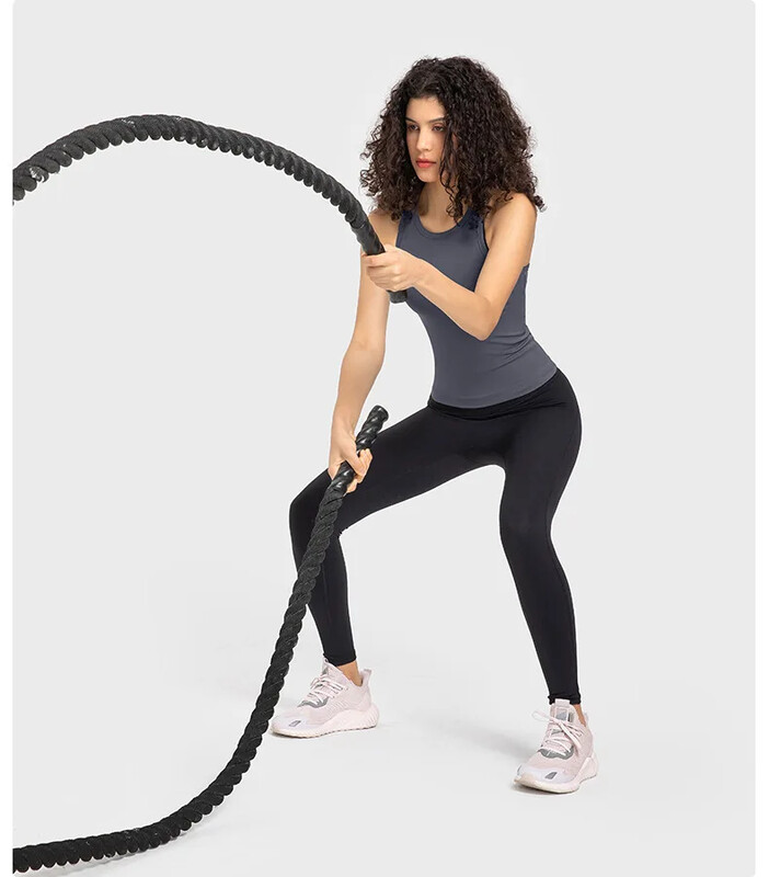 Moteriškas, prigludęs iki juosmens, sviestinis, minkštas lenktyninis, prakaitą sugeriantis, kvėpuojantis odai, elastingas jogos liemenis