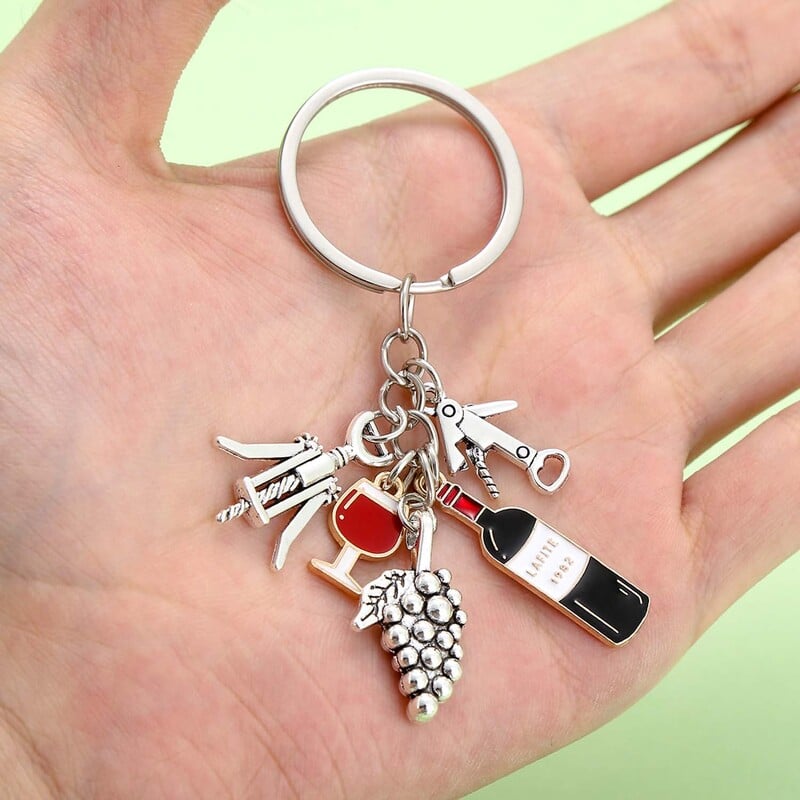 1 vnt. Madingas raudonojo vyno raktų pakabukas, lydinio vyno taurės, vynuogės, butelių atidarytuvo raktų pakabukas automobilio raktams, kuprinės, piniginės