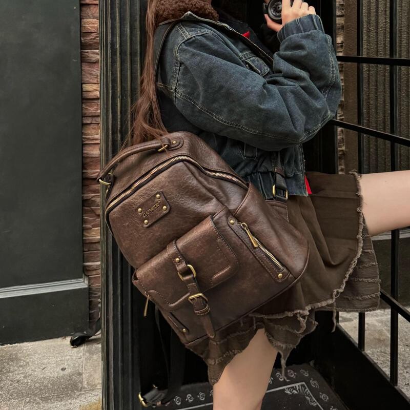 Amerikāņu retro motociklu stila mugursoma ar augstas klases vienkāršu un ikdienišķu daudzpusīgu, liela ietilpības modernu mugursomu