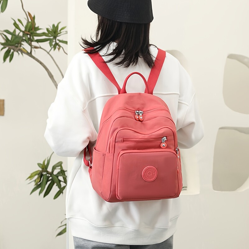 Jauna vienkārša sieviešu mugursoma, pārnēsājama ūdensnecaurlaidīga mugursoma atpūtai neilona auduma soma, sieviešu mugursoma