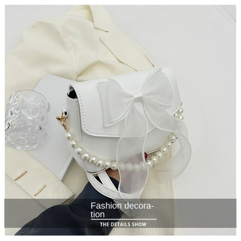 Melna sieviešu plecu soma korejiešu loku mezglu modes soma ar augšpusi ar rokturi sievietēm audekls, liela soma padusē 2024. gada dizaineru jaunas rokassomas