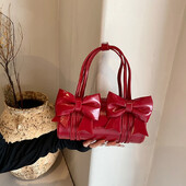 Izsmalcinātas Bow Glossy PU Boston plecu un Crossbody somas Divu izmēru Sense of Luxury Cute Sieviešu rokassomas 2025 Designer Style