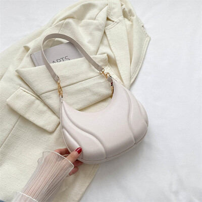 Ženska torba Luksuzne dizajnerske clutch torbe Jednobojna kožna torba na rame ispod pazuha Ležerna ženska torba za kupovinu Luksuzne skitnice torbe