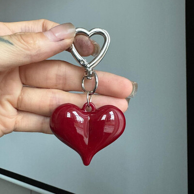 Izsmalcināta temperamenta sarkana sirds loku piekariņi Atslēgu piekariņš Daudzpusīgs tālruņa kulons Modes mugursoma Piekarināms Ornaments Aksesuāri Dāvanas