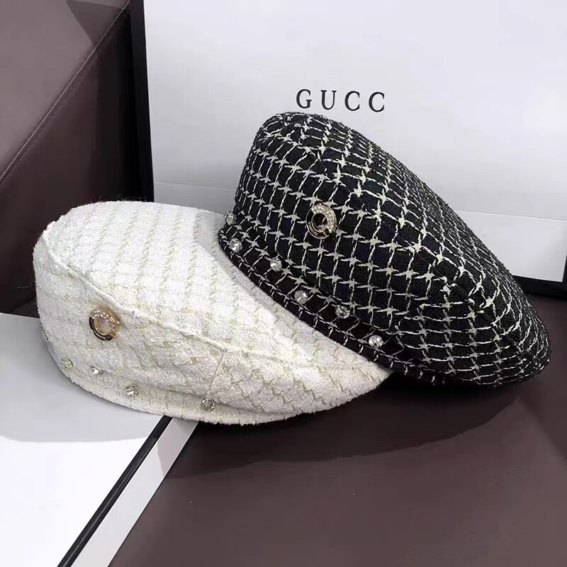 Jaunā rudens un ziemas režģa berete ir moderna un daudzpusīga sievietēm. Ikdienas ielu gleznotāja cepure Plakana astoņstūra cepure