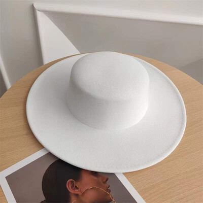 Francuski crni cilindar s velikim obodom Ženski elegantni fedora šešir s ravnim vrhom u retro stilu Britanski biserni šešir s cvjetnim obodom Fotografija