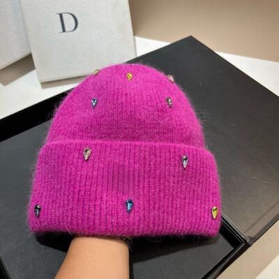 Modes siltas skulles Angola Trušu kažokādas ziemas trikotāžas pupiņas Sieviešu cepures Sieviešu slēpes āra siltas kašmira vilnas cepures vairumtirdzniecība