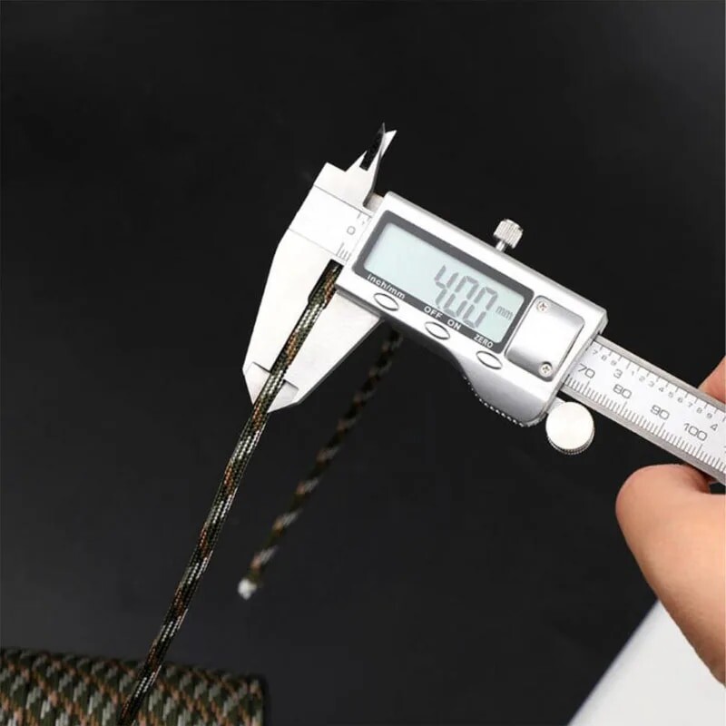 7 serdeņi 550 Paracord vads 100 M diametrā 4 mm, paredzēts izdzīvošanai āra kempingā.