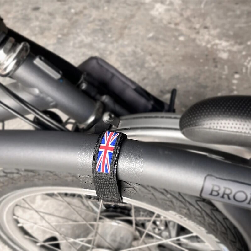 Paredzēts Brompton velosipēda rāmja riteņa fiksētas siksnas siksnas saliekamai velosipēda āķa cilpai riteņbraukšanas velosipēda bikšu siksnām