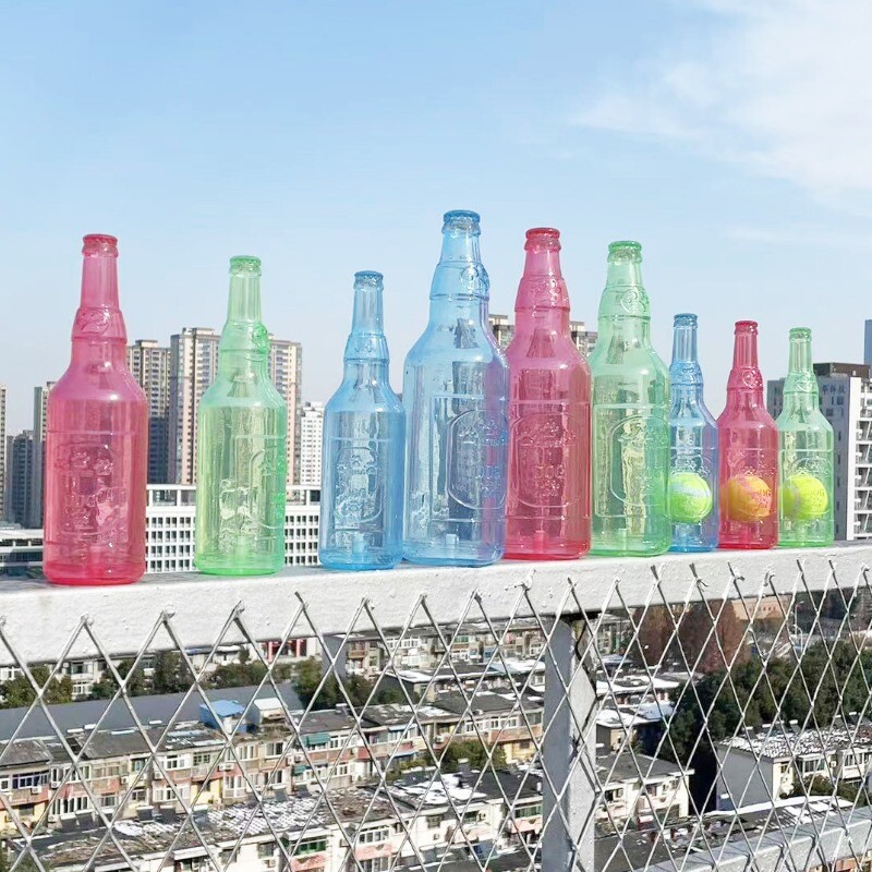 Играчка за дъвчене за домашни любимци Устойчива на звук от ухапване моларна плаваща гумена TPR бутилка за тенис, топка за бутилка за домашни любимци Аксесоари за играчки